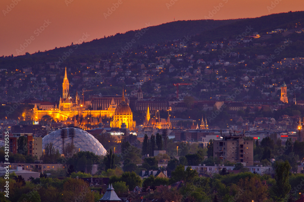 Budapest at night when the sun is going down