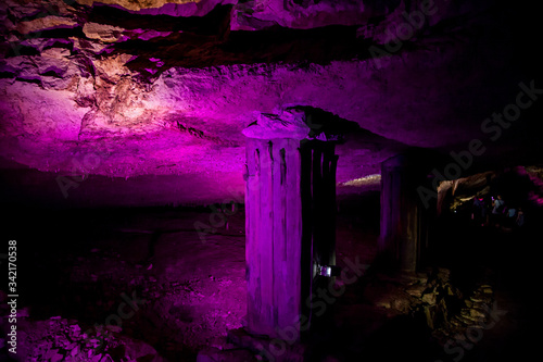 cave with rock growths with illumination