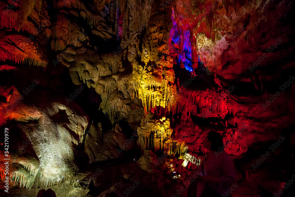 cave with rock growths with illumination