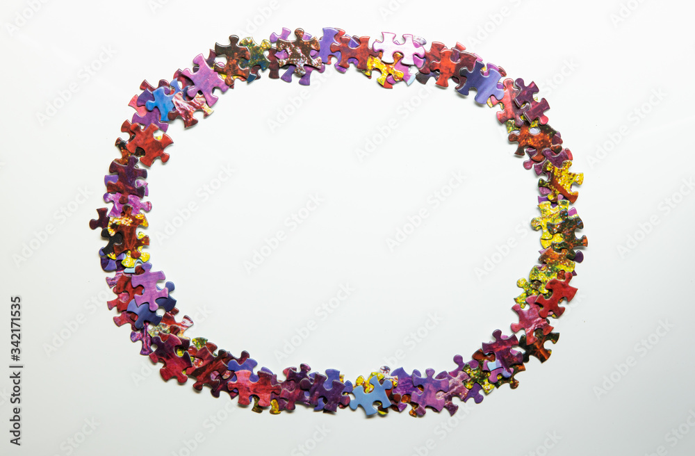 Puzzle pieces in a round shape isolated on white background Puzzle pieces in a round shape isolated on white background