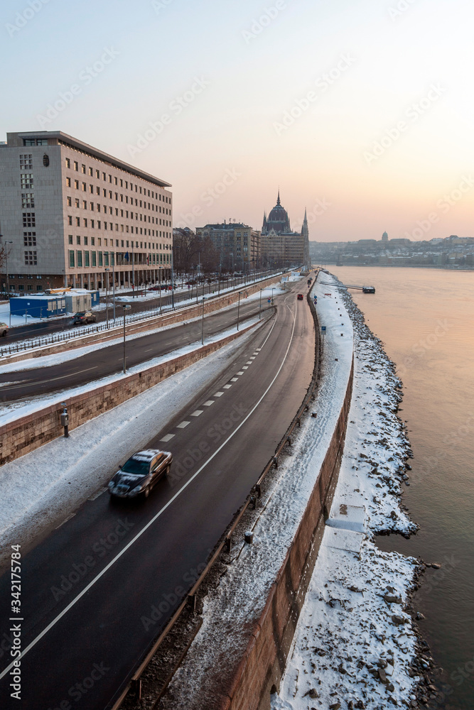 Fototapeta premium The river Danube on a cold winter day with the Hungarian Parliament building in the background