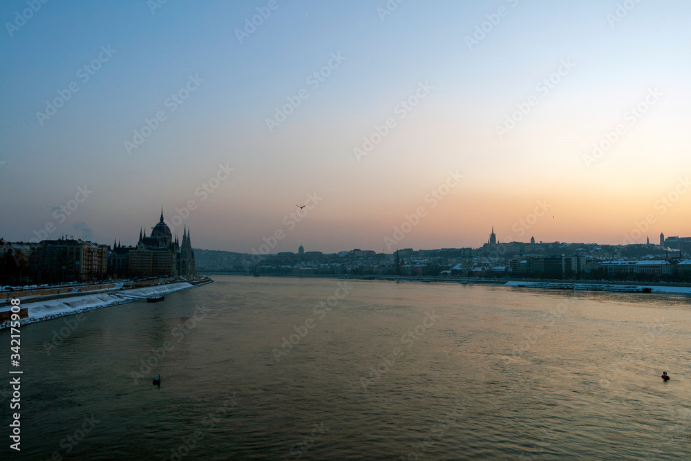 The river Danube on a cold winter day with the Hungarian Parliament building in the background