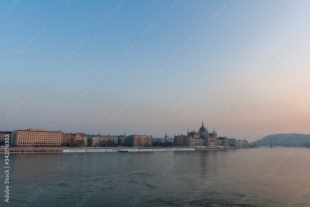 The river Danube on a cold winter day with the Hungarian Parliament building in the background