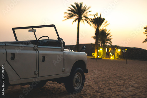 Photography Bedouin camp with Land Rover in the foreground in the desert of Dubai - UAE