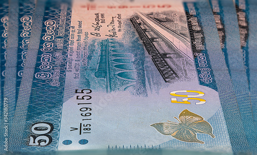 Macro photography of sri lanka 50 rupees money. Sri Lanka 50 Rupees. Close up to the Sri Lanka paper currency.  new and old Manampitiya bridge on the front. Magnification capture of asian money photo