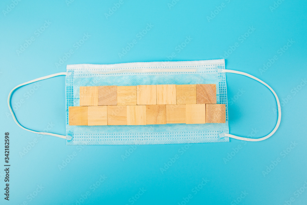 Surgical mask or Medical face mask for protection corona virus with blank wooden block Surgical mask or Medical face mask for protection corona virus with blank wooden block