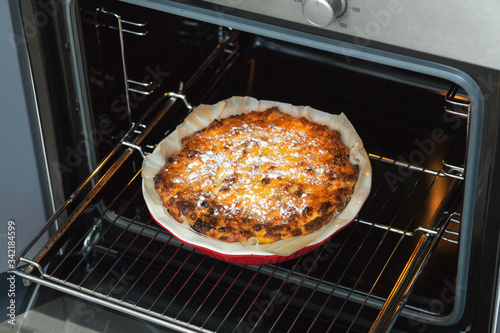 Oven baked cottage cheese casserole. In red baking dish