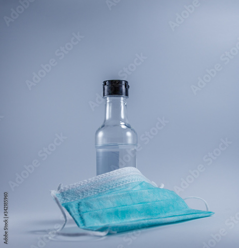 Alcohol Gel Hand Sanitizer and Disposable Hygienic or medical Mask, health care.