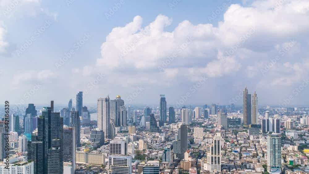 Bangkok business district city center above Silom area, with cloud pass over buildings and skyscrapers, zoom out � Time Lapse Bangkok business district city center above Silom area, with cloud pass over buildings and skyscrapers, zoom out � Time Lapse