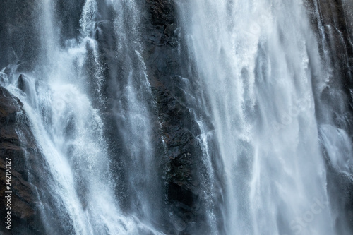 Skjervsfossen waterfall falling blur water close. Norway nature journey view powerful white sparkle silky stream 
