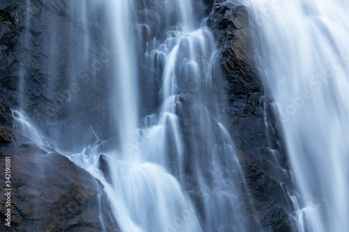 Skjervefossen waterfall falling blur water close. Norway nature journey wallpaper view powerful white sparkle silky stream 