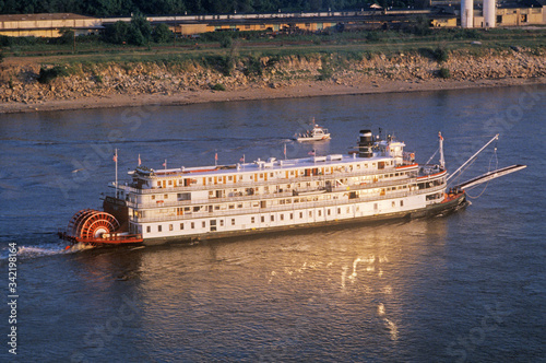 The Delta Queen, a relic of the steamboat era of the 19th century, still rolls down the Mississippi River photo