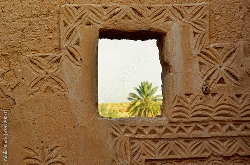 window in a mud wall in Riyadh, Saudi Arabia
