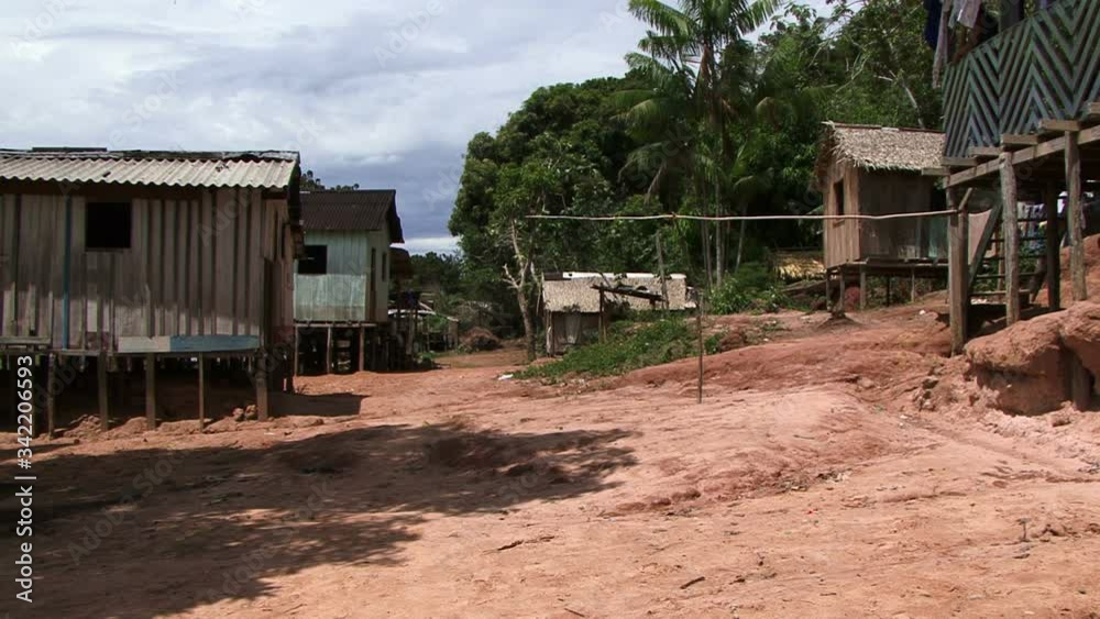 Village in the Amazon rain forest with people Village in the Amazon rain forest with people