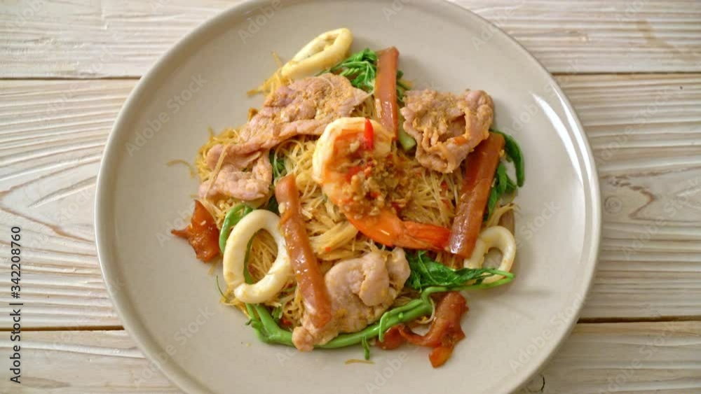 Stir-fried rice vermicelli and water mimosa with mix meat Stir-fried rice vermicelli and water mimosa with mix meat