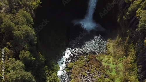 Aerial View of River and Waterfall in Tolhuaca National Park, Chile. Breathtaking Landscape Under Evening Sunlight photo