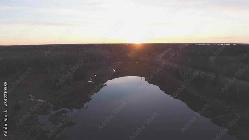 Drone Shot of Pond and Forest at Sunset Drone Shot of Pond and Forest at Sunset