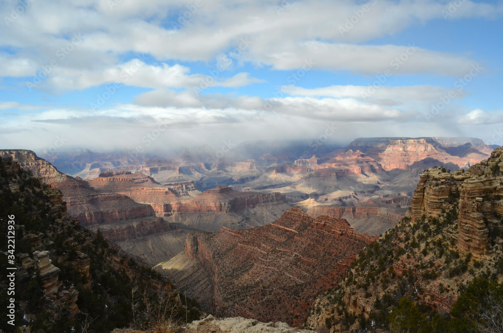 clouds move through grand canyon