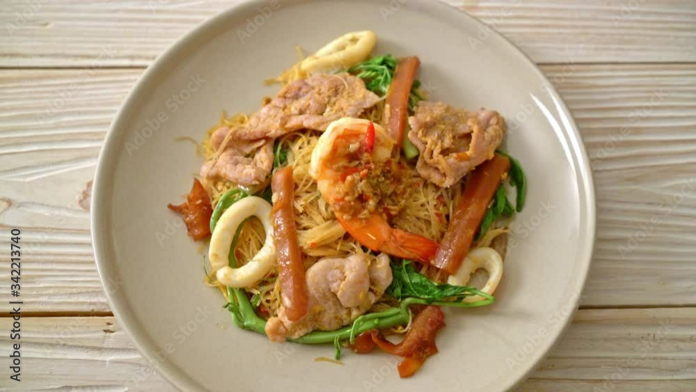 Stir-fried rice vermicelli and water mimosa with mix meat Stir-fried rice vermicelli and water mimosa with mix meat