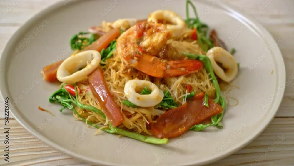 Stir-fried rice vermicelli and water mimosa with mix seafood Stir-fried rice vermicelli and water mimosa with mix seafood