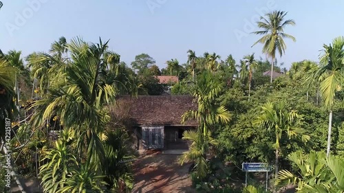 Aerial Footage of First Ho Chi Minh Memorial Museum House in Nakhon Panom, Thailand photo