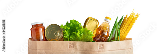 A bag of donated food. The concept of the delivery of necessary foodstuffs on a white background.
