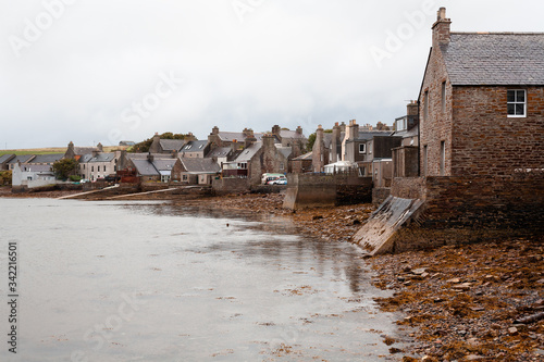 Casual view on the St. Margaret Hope village in Scotland, UK at cloudy weather