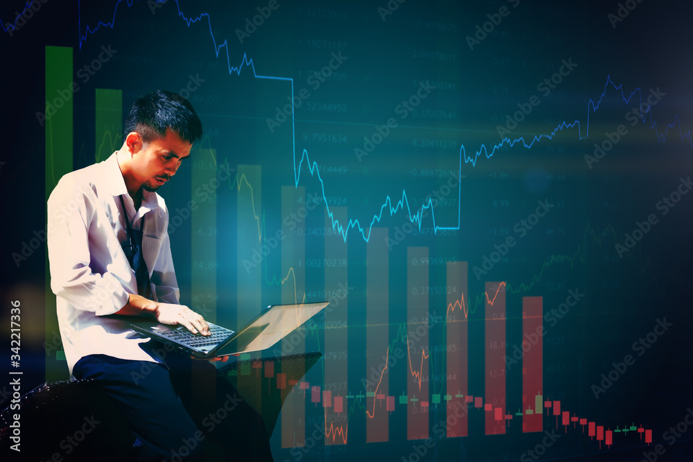 Stressed man standing playing tablet. Negative Concept of Economic impact. Negative concepts of COVID-19 impact. Economic downturn Concept. Unemployment and stress Concept. Stressed man standing playing tablet. Negative Concept of Economic impact. Negative concepts of COVID-19 impact. Economic downturn Concept. Unemployment and stress Concept.