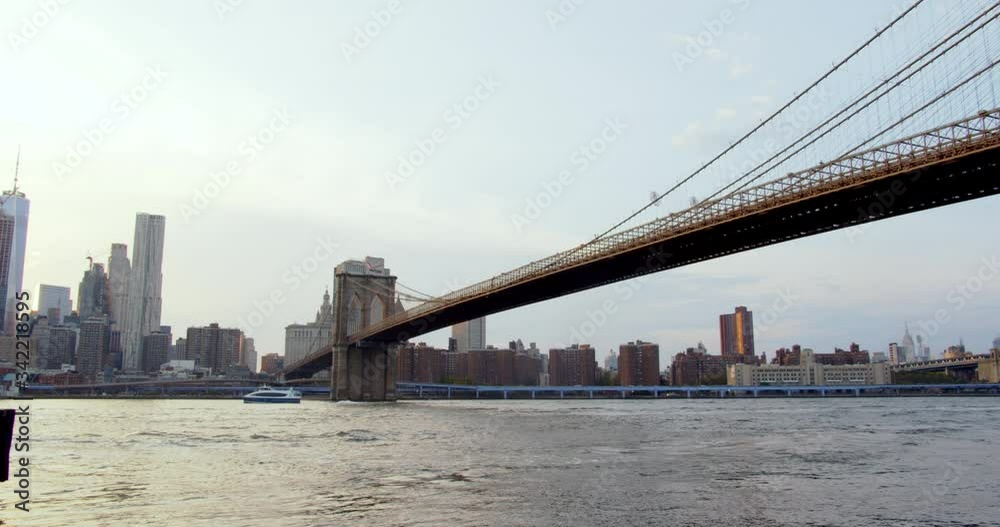 The famous Brooklyn Bridge crossing East River, Manhattan, New York City. The famous Brooklyn Bridge crossing East River, Manhattan, New York City.