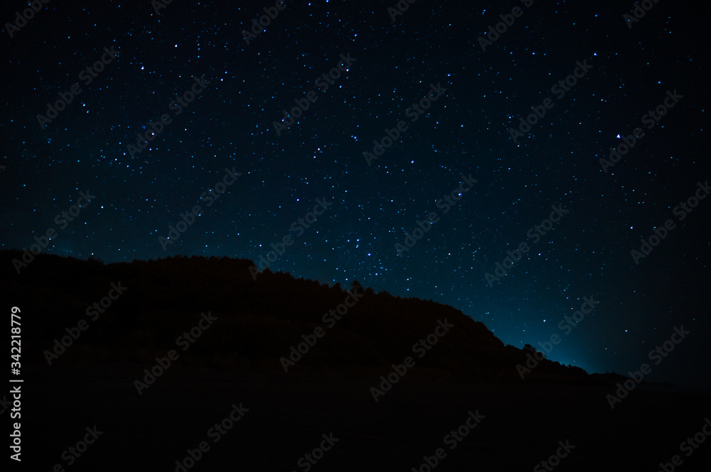 Night landscape with starry sky. Astrology, space
