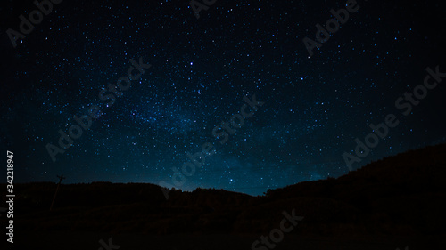 Night landscape with starry sky. Astrology, space