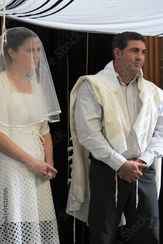 Jewish bride and a bridegroom wedding Ceremony photo