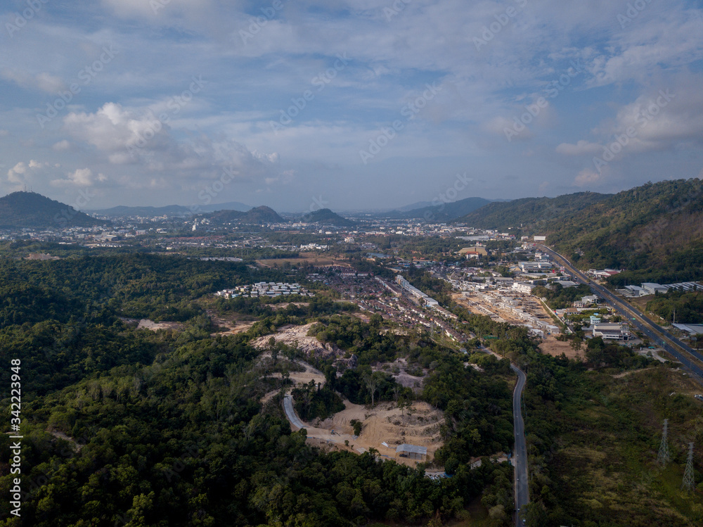 aerial view of the city around the picturesque mountains at sunrise