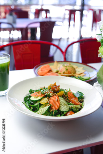 fresh salad with carrots and cucumber