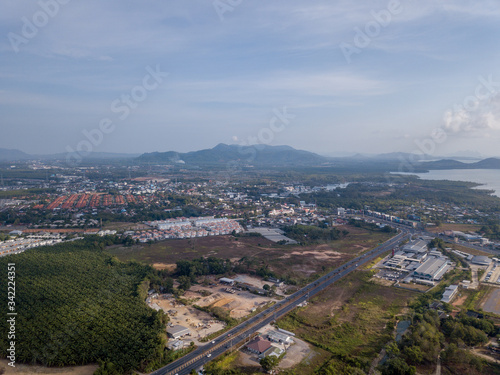 aerial view of the city around the picturesque mountains at sunrise, Kathu, Phuket