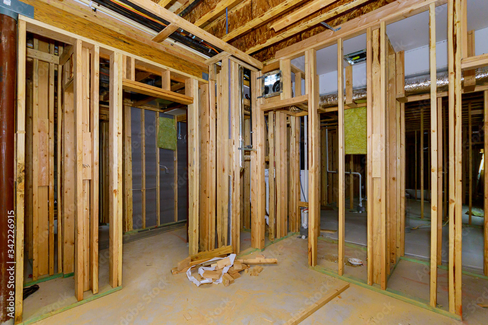 Fototapeta premium Residential home beams framing stick basement unfinished under construction