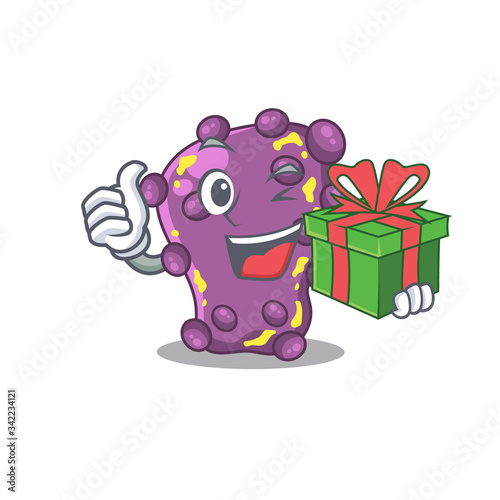 Smiling shigella cartoon character having a green gift box