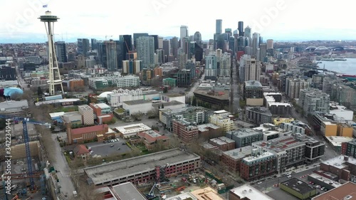 Aerial / drone footage of the Space Needle, empty streets in Belltown, near Seattle Center, no people downtown, in the commercial district of Seattle, Washington during the pandemic photo