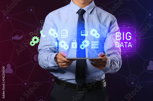 Businessman with tablet com...