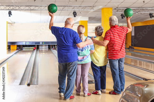 Senior people playing bowli...