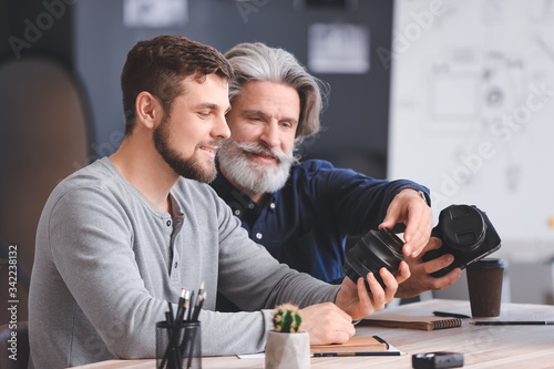 Mentor teaching young photo...