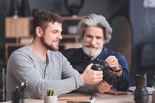 Mentor teaching young photo...