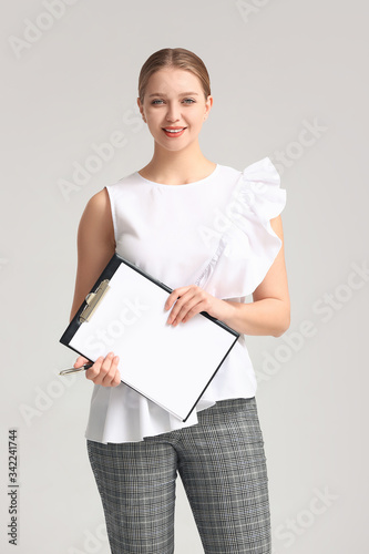 Portrait of young businessw...