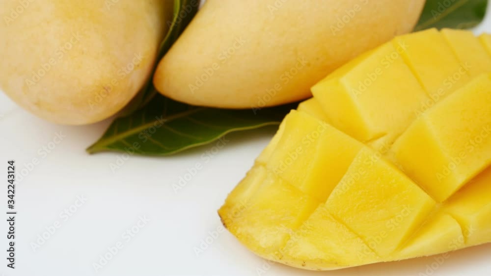 Fresh mango and slice mango on white background. Fresh mango and slice mango on white background.