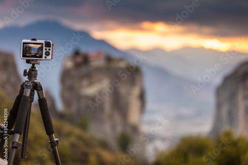 Camera on tripod and Meteora monasteries