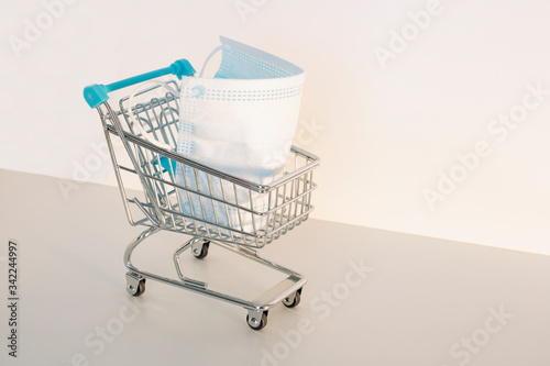 Giant surgical mask in a shopping cart