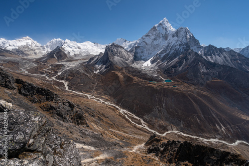 Fototapeta Naklejka Na Ścianę i Meble -  Ama Dablam mountain peak view from Dingboche view point in Everest base camp trekking route, Himalaya mountains range in Nepal