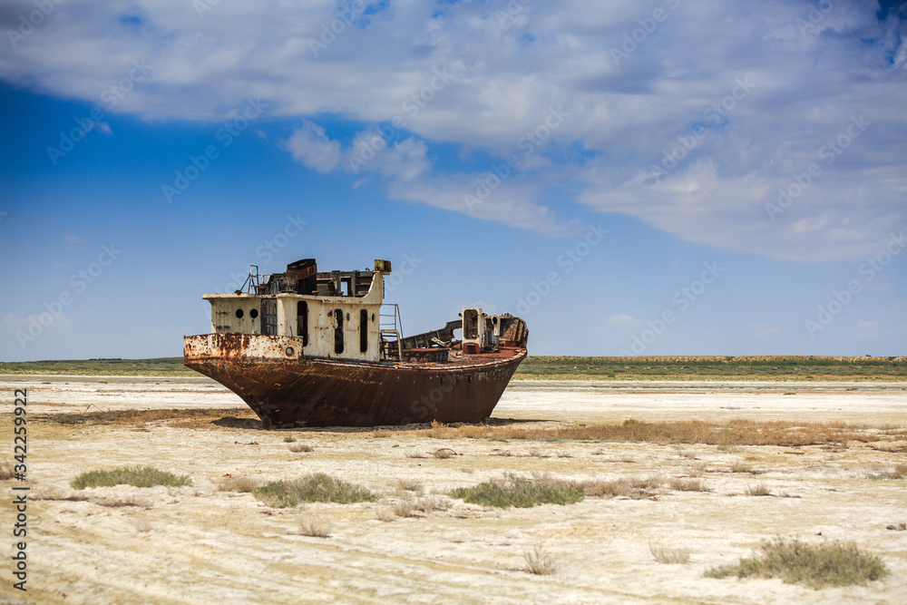 Poster Old fishing schooner at the bottom of the dried Aral Sea – Wall ...