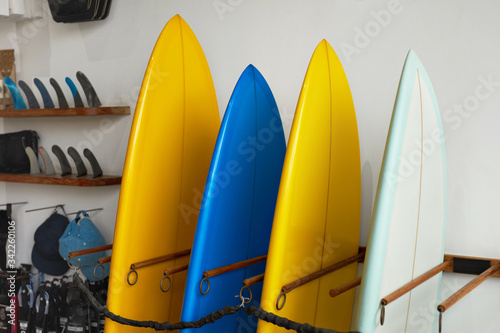 Surf Shop. Set Of Surfboards Standing In Stack At Rental Place On Beach. Water Sport Equipment, Healthy Lifestyle At Tropical Ocean.