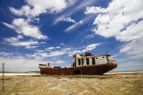 Old fishing schooner at the bottom of the dried Aral Sea